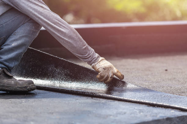 Professional Basement Waterproofing technician working in Oldenburg, IN